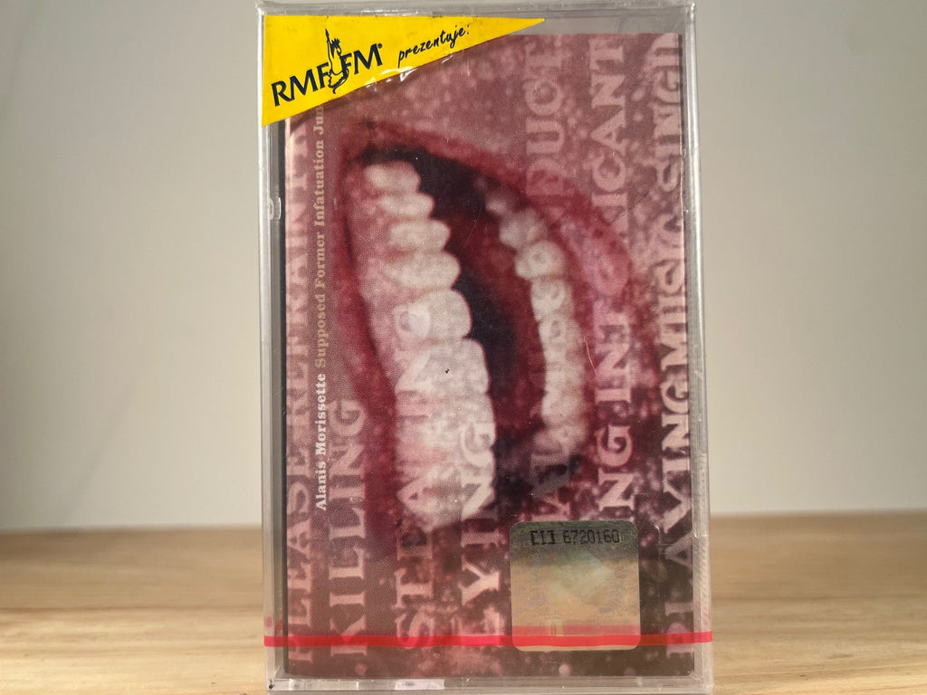 ALANIS MORISSETTE - supposed former infatuation junkie - CASSETTE TAPE [made in poland]